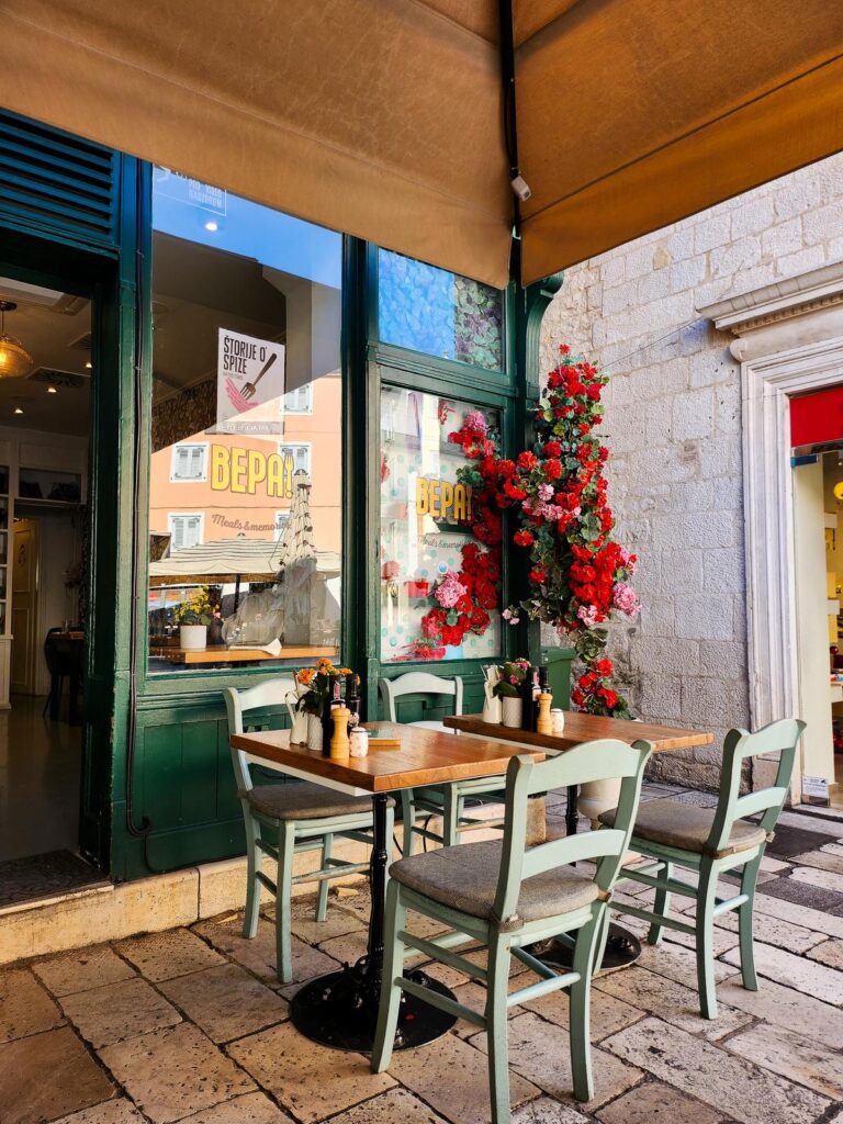 Outdoor dining at Bepa restaurant in Split, Croatia, showcasing the allure of historic city dining.