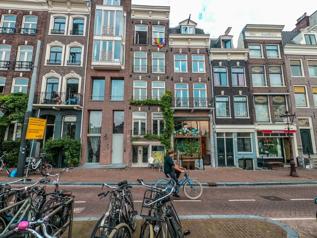 Charming Amsterdam canal houses and daily life scene