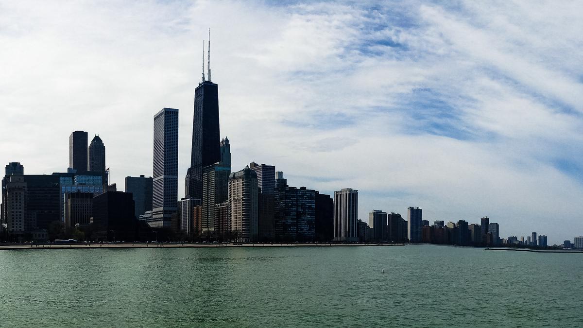 Chicago skyline view from Lake Michigan with serene waters and skyscrapers