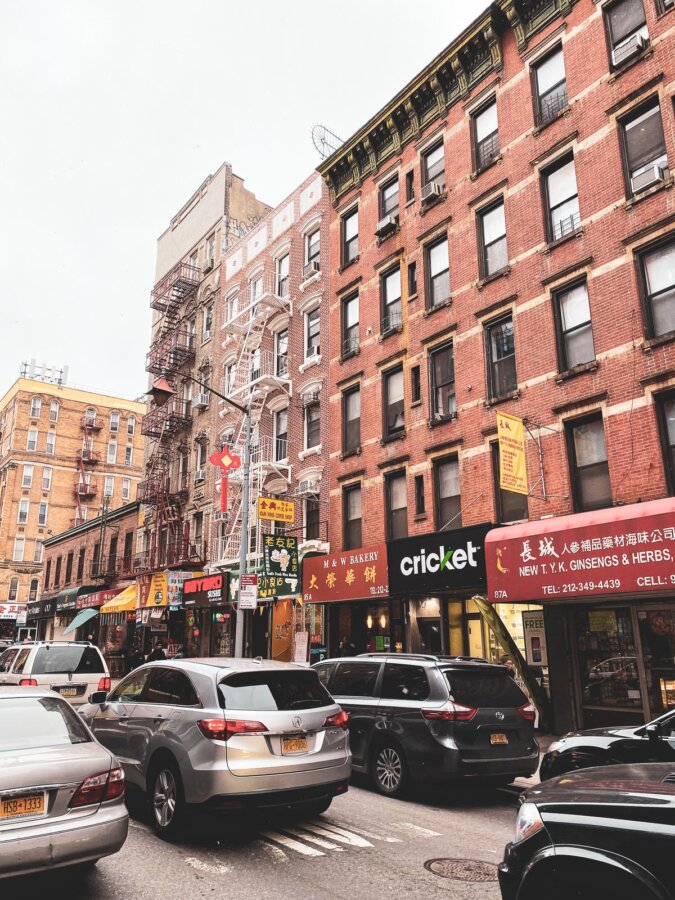 Vibrant Chinatown, NYC with colorful storefronts and bustling streets