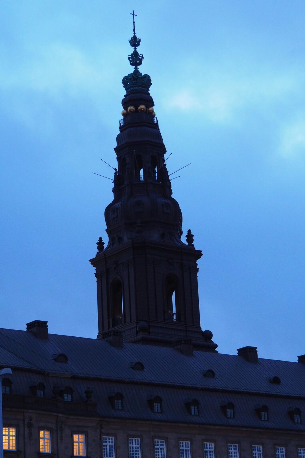 Twilight view of Christiansborg Palace spire in Copenhagen
