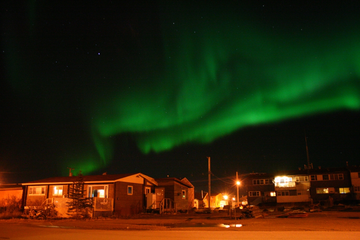 Houses and the northern lights view at Manitoba, Churchill, Canada