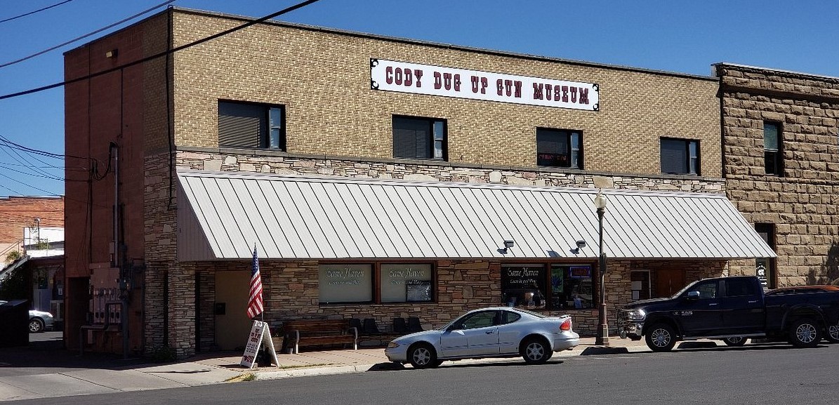 Cody Dug Up Gun Museum sign and building in Cody, Wyoming
