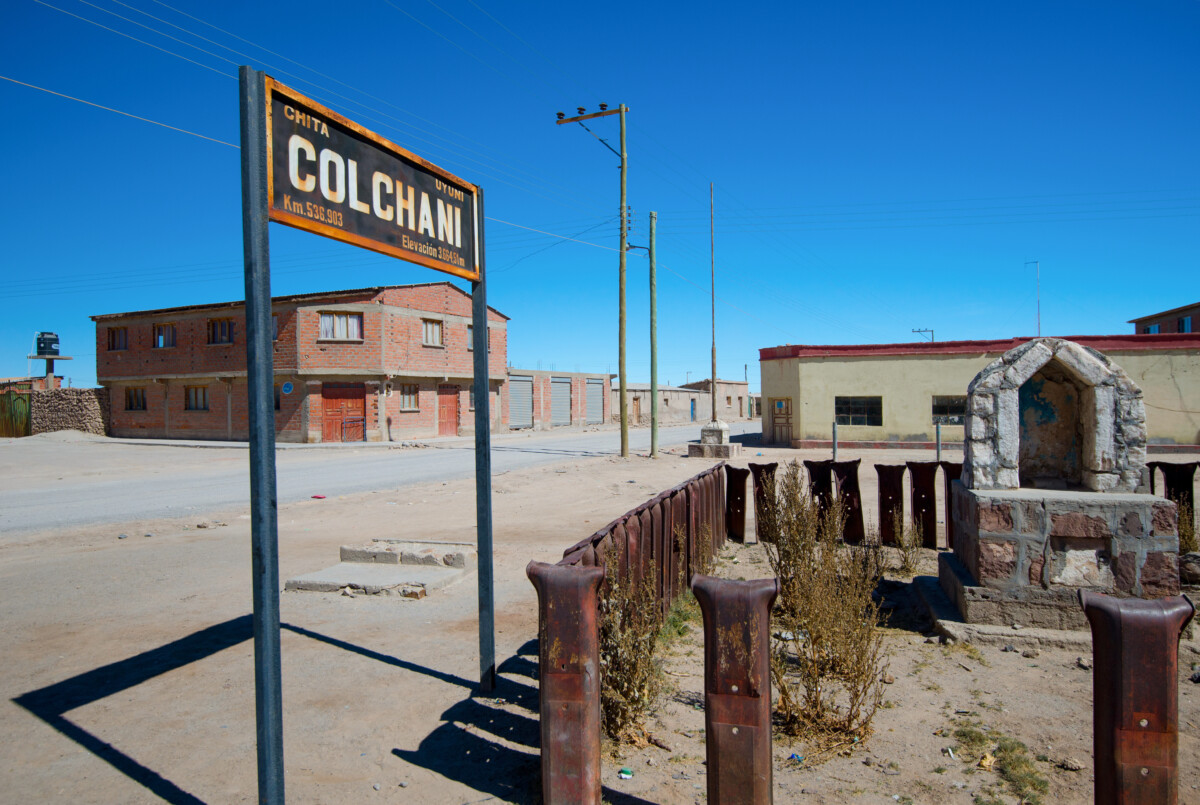 Colchani sign and houses in Colchani village on the edge of the Salar de Uyuni, Bolivia