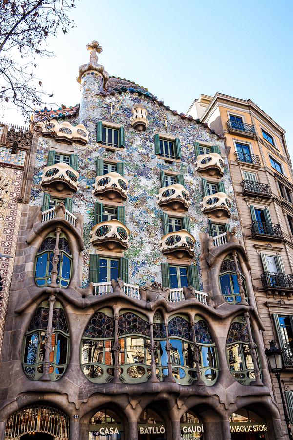 Colorful Casa Batlló by Gaudí on vibrant color street in Barcelona, Spain