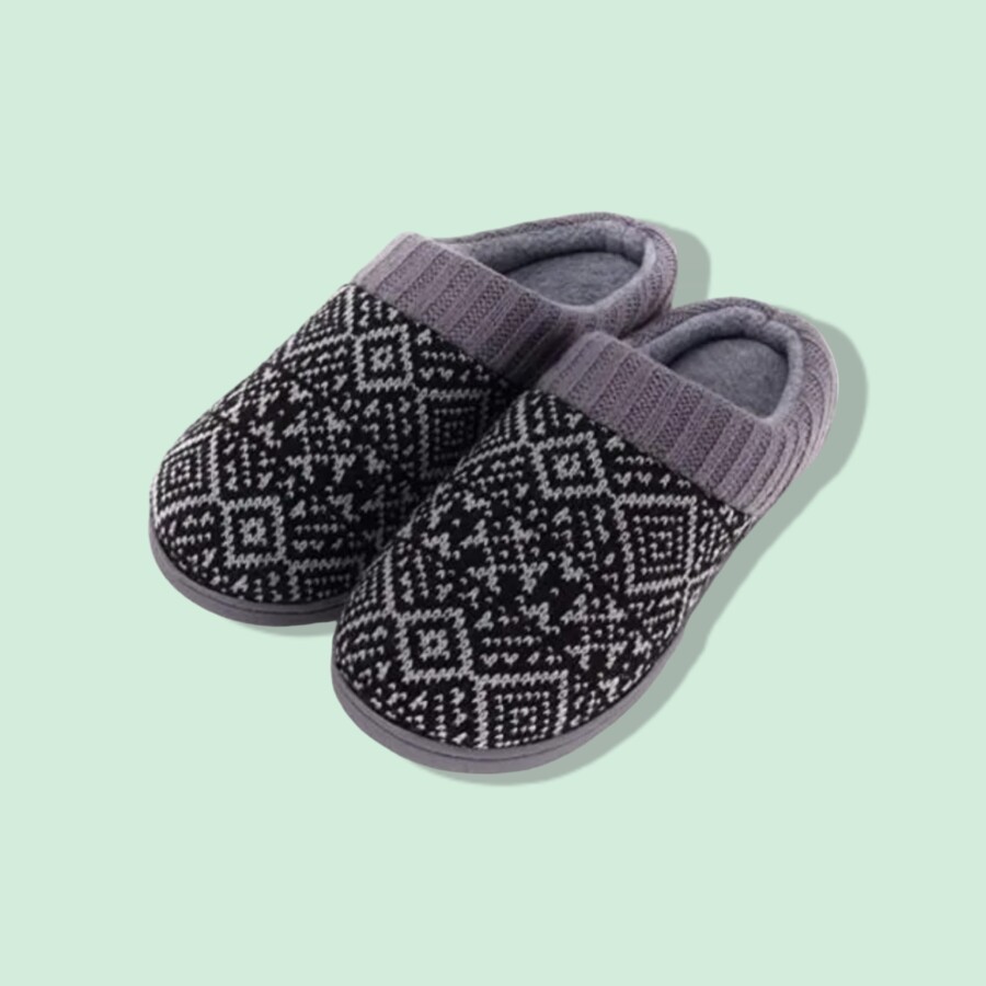 Pair of comfortable slippers as travel essential