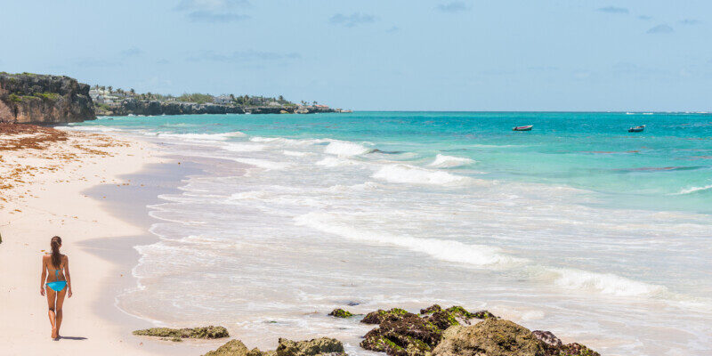 Tourist exploring the Crane Beach in Barbados