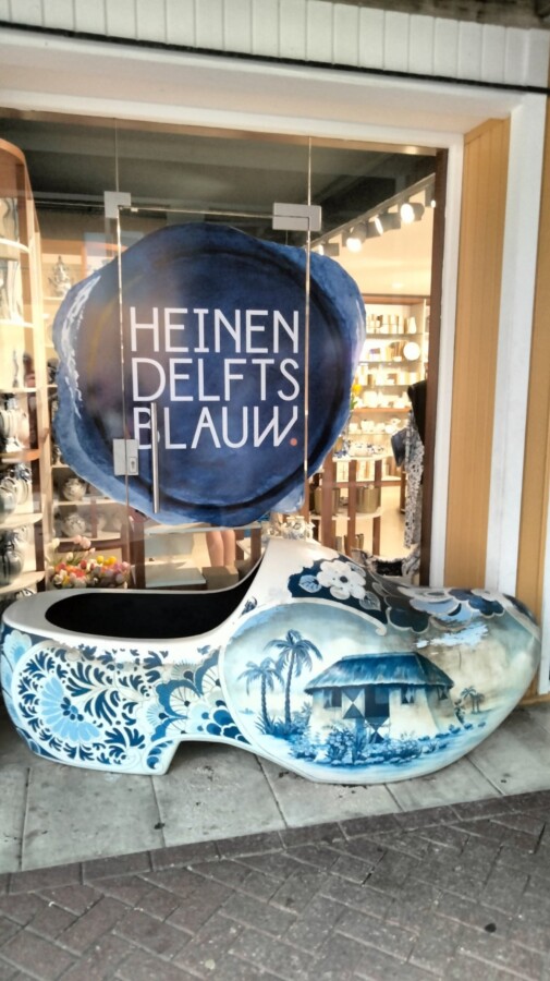 Delft blue ceramics shop in Amsterdam with giant painted Dutch clog.