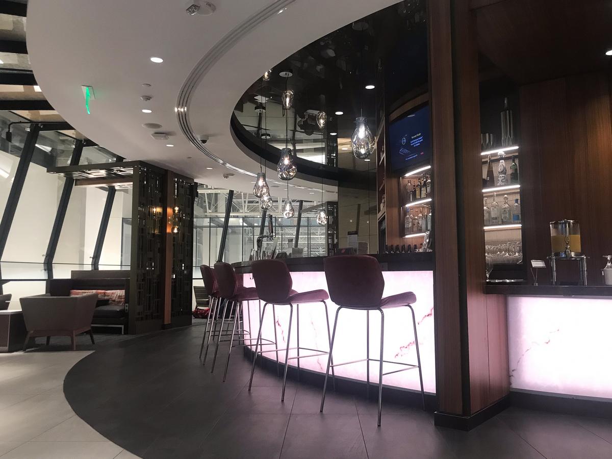 Luxurious and inviting Delta Sky Club lounge at Austin-Bergstrom International Airport, featuring modern decor and premium amenities.