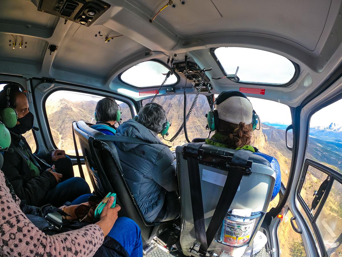 Helicopter tour passengers over Denali National Park, Alaska