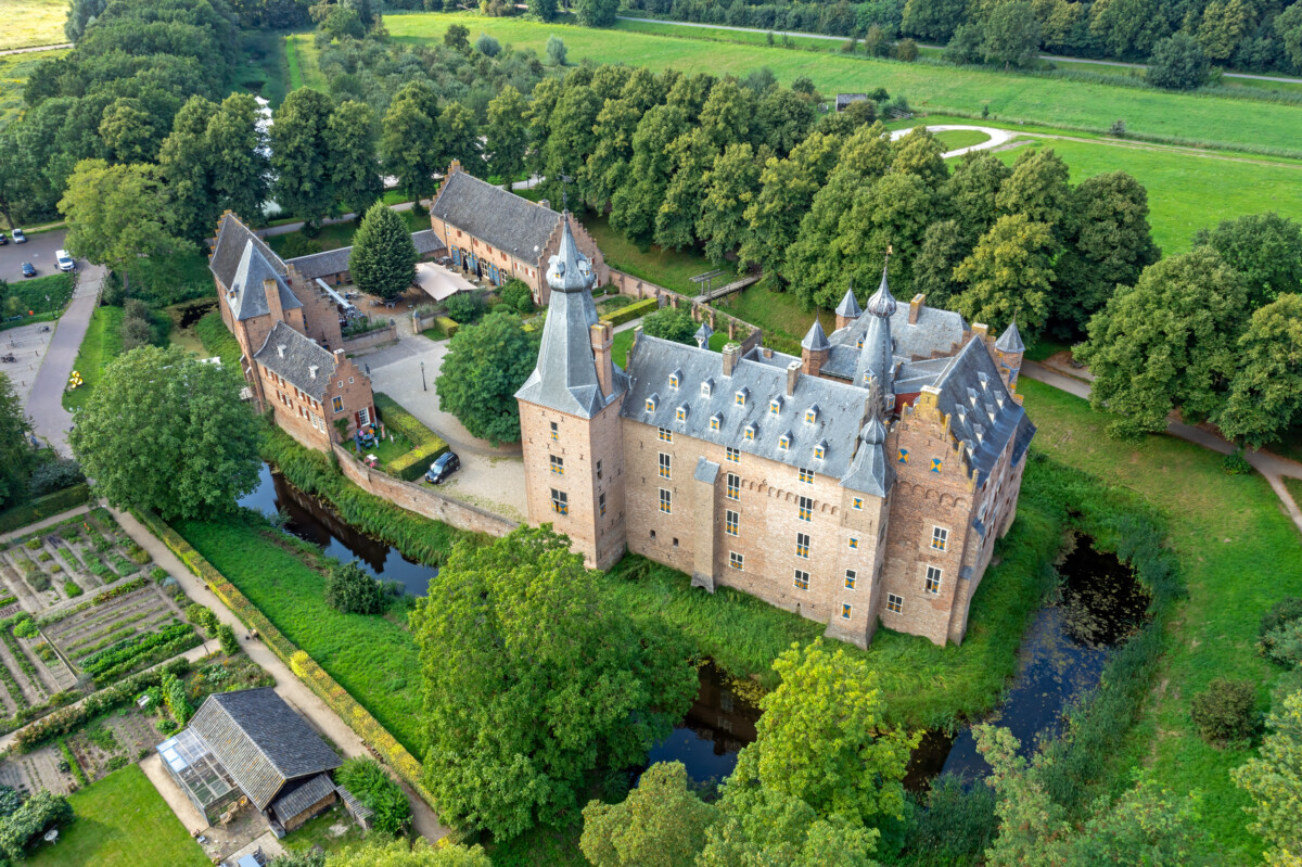 Aerial view of Doorwerth Castle beside wooded grounds in Gelderland