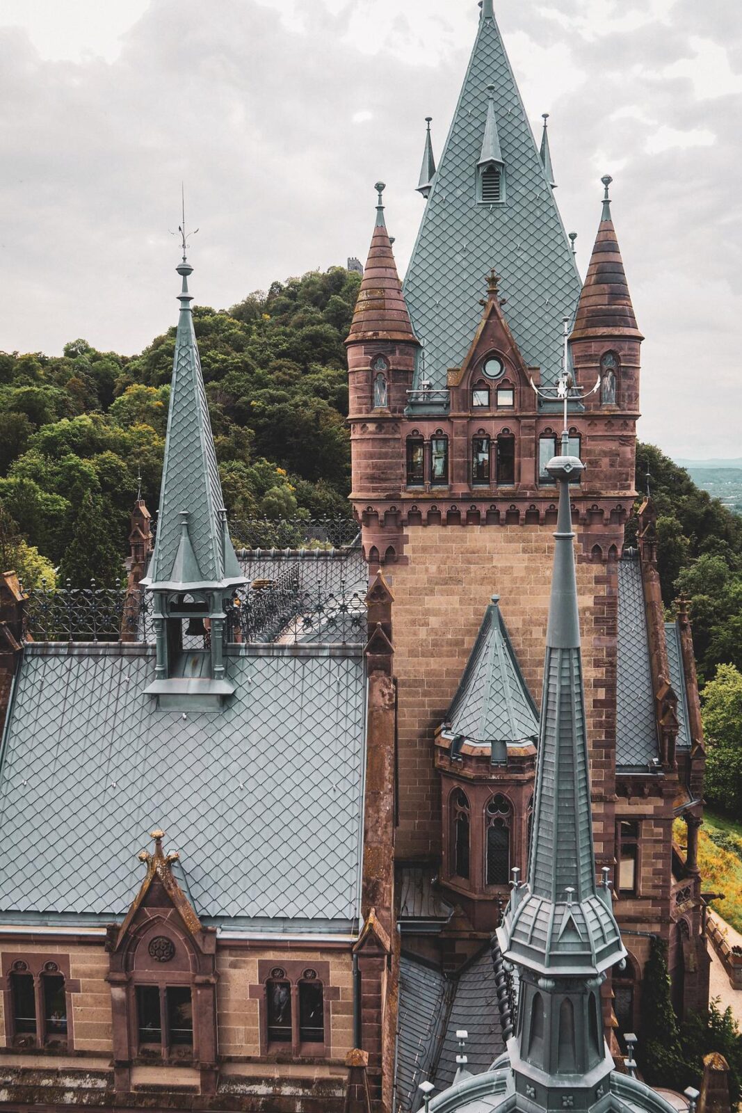 Aerial view of Drachenburg Castle's turrets and rooftops