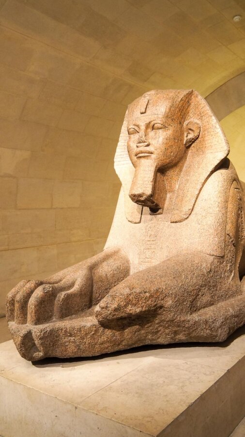 Ancient Egyptian Sphinx sculpture in the Louvre Museum, Paris