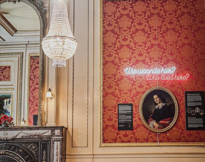 Elegant interior at Museum of the Canals Amsterdam, ornate chandelier and historical exhibits