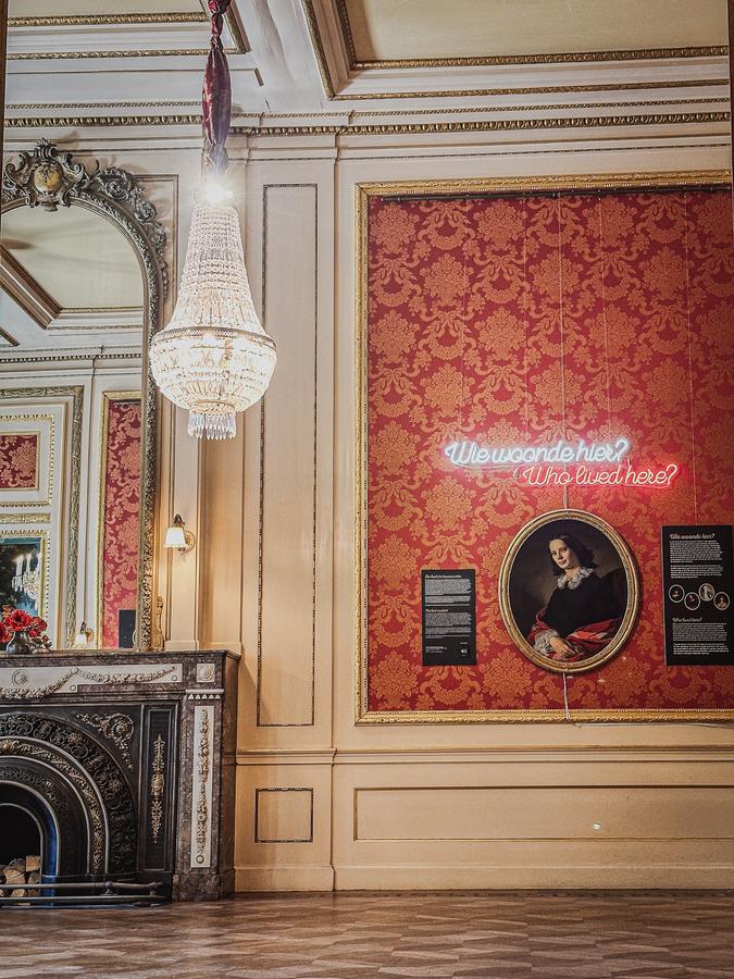 Elegant interior at Museum of the Canals Amsterdam, ornate chandelier and historical exhibits