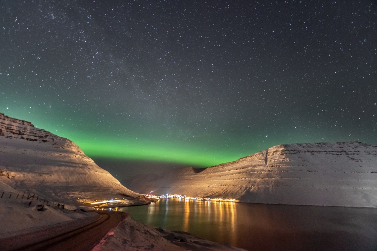 Panoramic view of orthern Lights over the Hvannasund in Faroe Islands