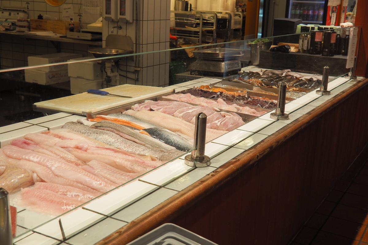 Fresh seafood for sale at Fiskebrygga Kristiansand Fish Market in Norway
