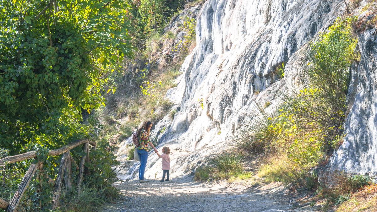 Mother and child explore Fosso Bianco Hot Springs