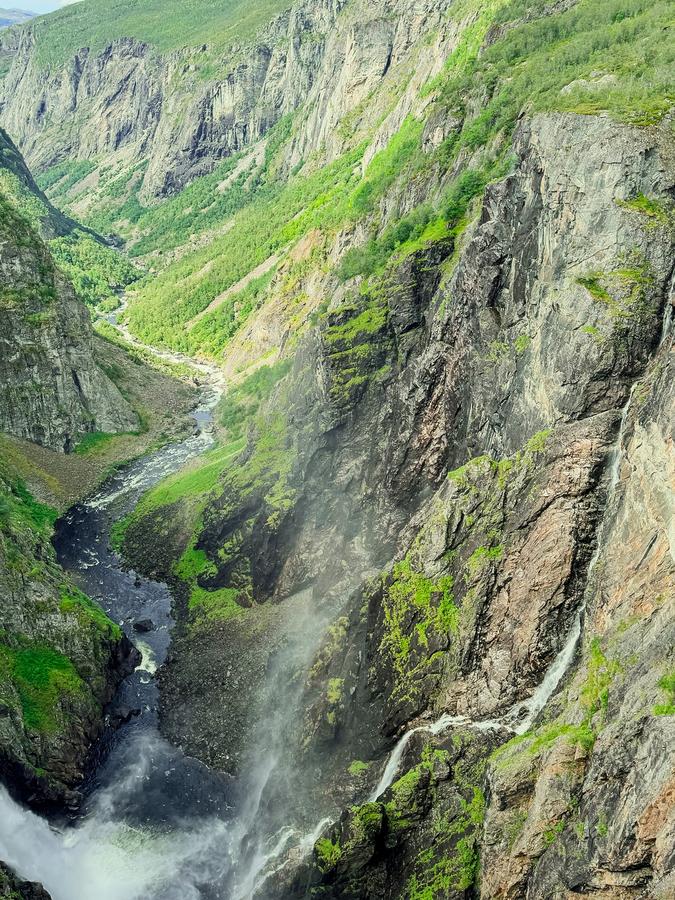 Voringsfossen Gorge waterfall cascading down rocky cliffs in Eidfjord, Norway