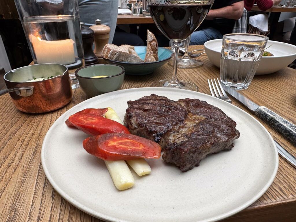 Gourmet dining experience featuring succulent steak at top-rated Amsterdam restaurant