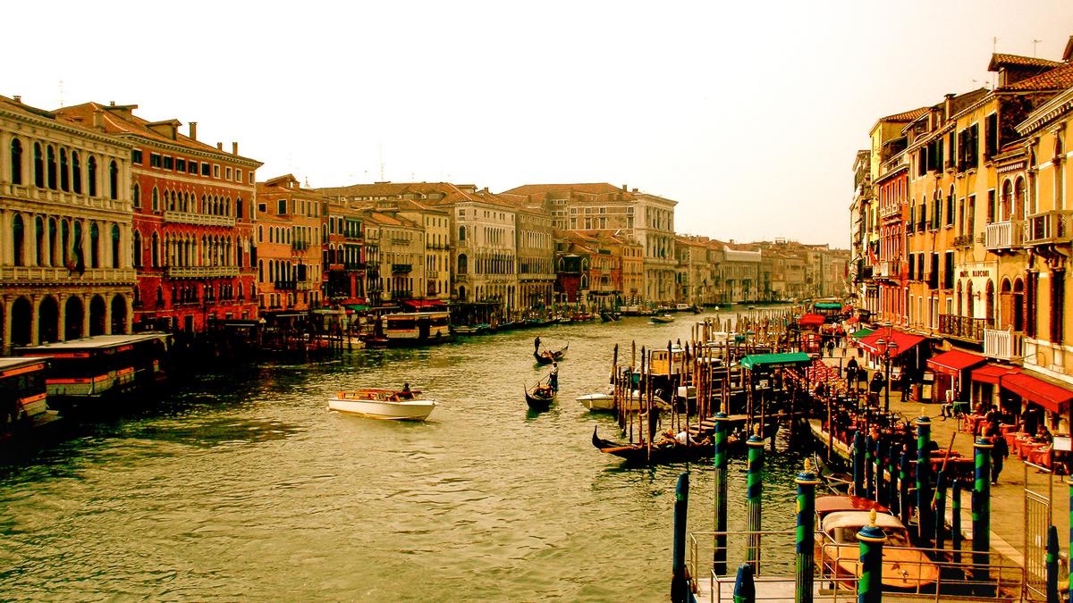 Grand Canal Venice, Italy: Gondolas, historic architecture on iconic waterways.