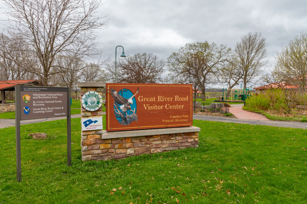 Great River Road Visitor Center sign and entrance at Freedom Park in Prescott, Wisconsin