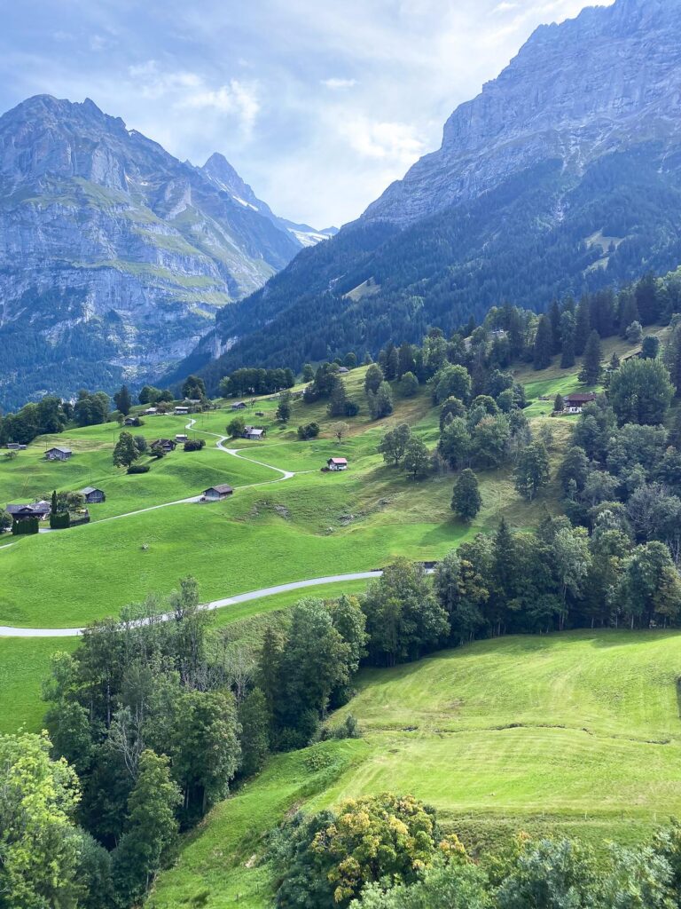 Stunning Alpine landscape in Grindelwald, Switzerland with traditional chalets