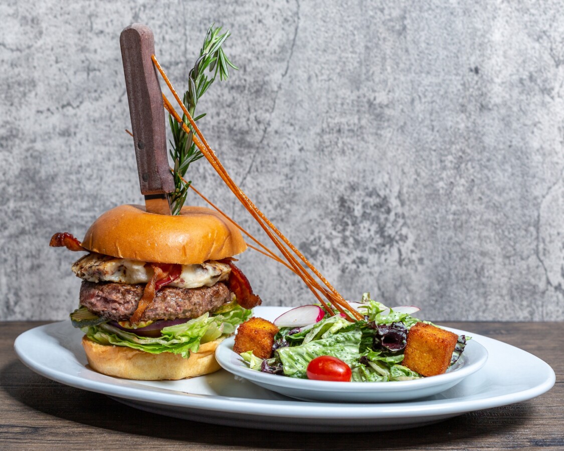 Burger and salad served at Hash House A Go Go