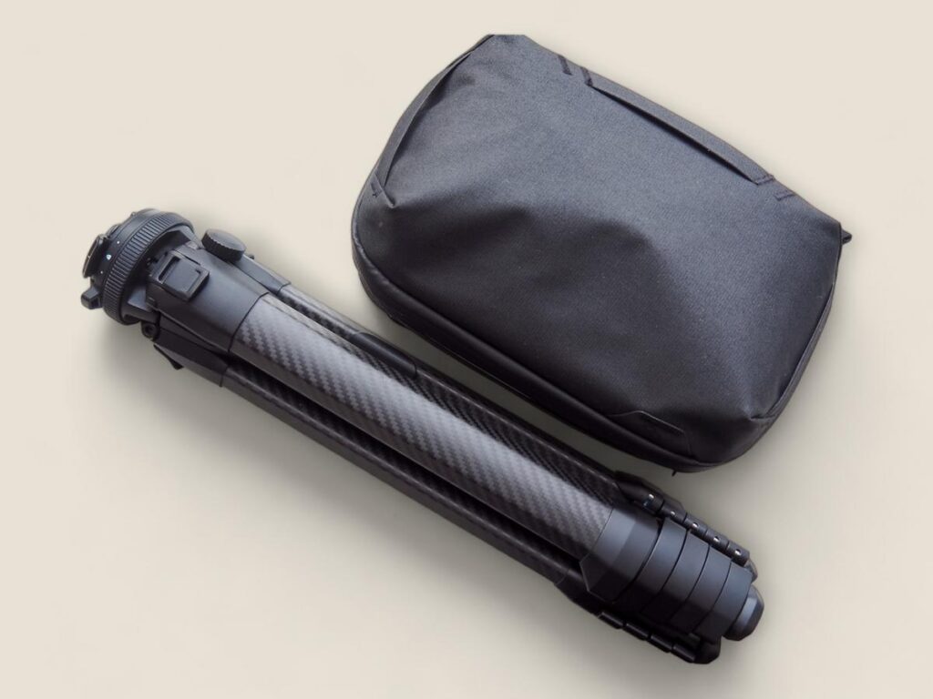 Peak Design Travel Tripod and Tech Pouch arranged for a travel photography kit