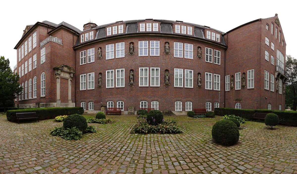 Hamburg landmarks and monuments: historic red-brick courtyard with cobblestones.