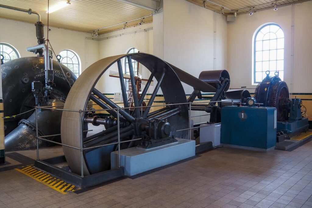 Inside the Historical Pumping Station at Kinderdijk, Netherlands - Well-preserved machinery and vintage steam engines reflecting Dutch industrial heritage.