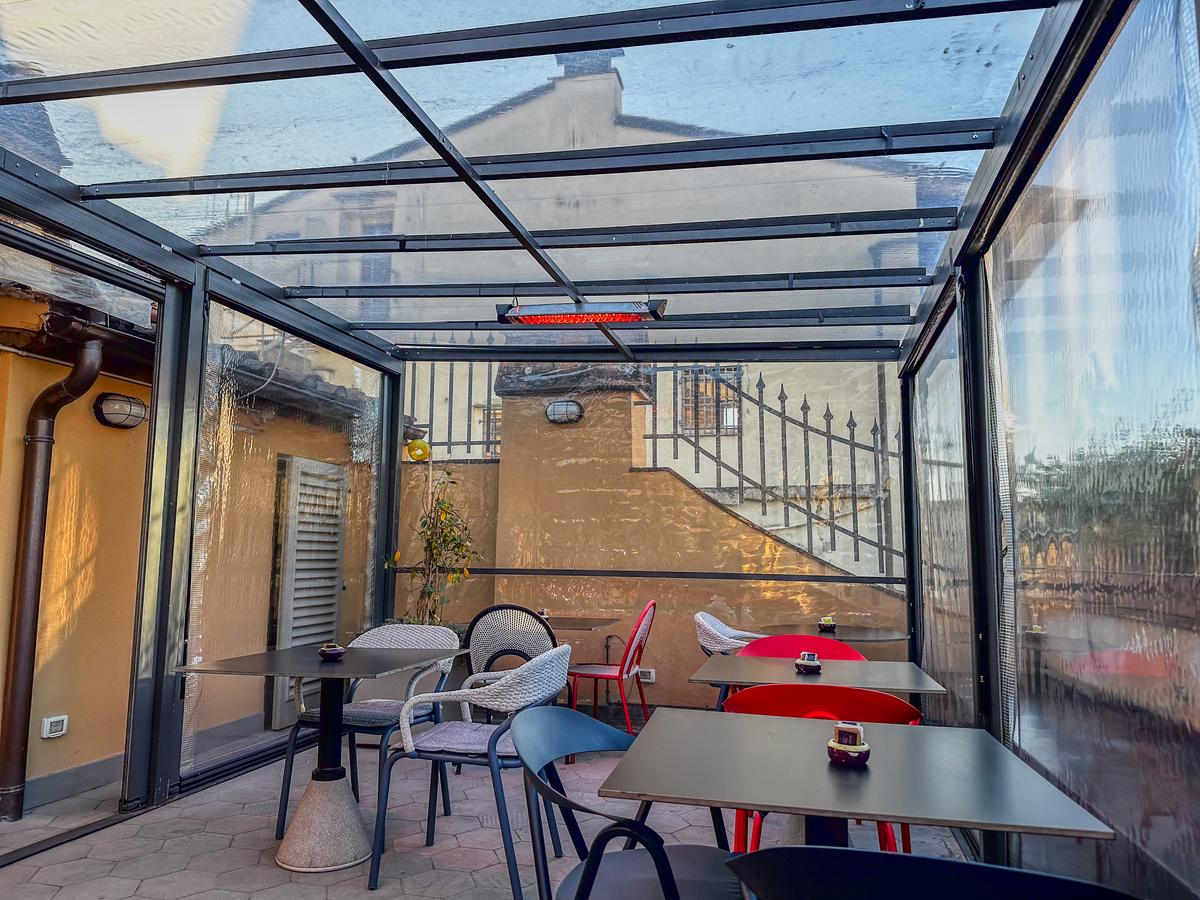 Hotel Milù Florence glass rooftop terrace with stylish seating
