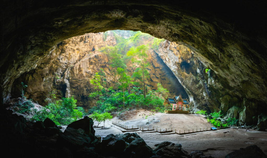 Amazing Phraya Nakhon cave in Khao Sam Roi Yot national park at Prachuap Khiri Khan Thailand is small temple in the sun rays in cave.