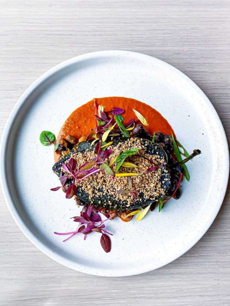 Innovative Indigenous Cuisine at Owamni Restaurant in Minneapolis: Vibrant dish with local ingredients and modern flair.