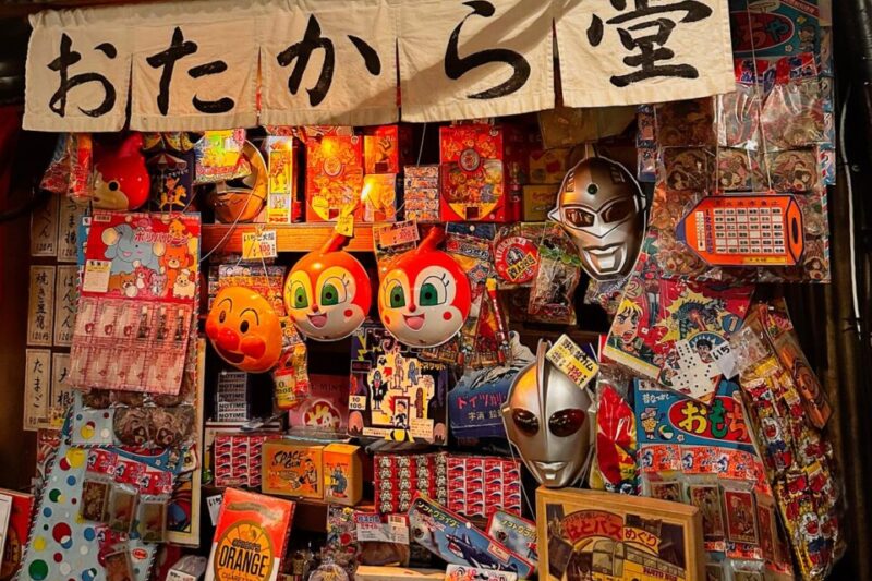 Display of Japanese souvenirs at Kodawari Ramen Yokochō in Paris.