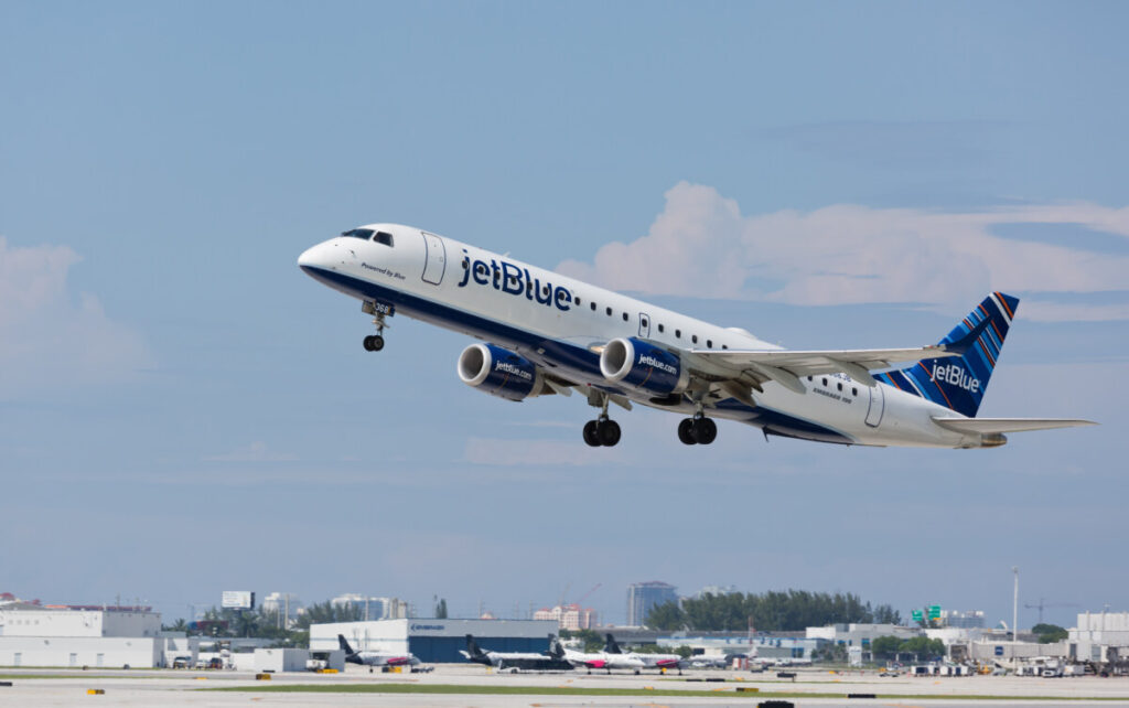 JetBlue Airways Embraer 190 aircraft departing an airport