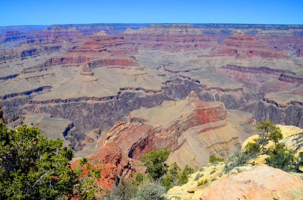 Grand Canyon is a steep-sided canyon carved by the Colorado River adjacent rim are contained within Grand Canyon National Park, the Kaibab National Forest, Grand Canyon-Parashant National Monument