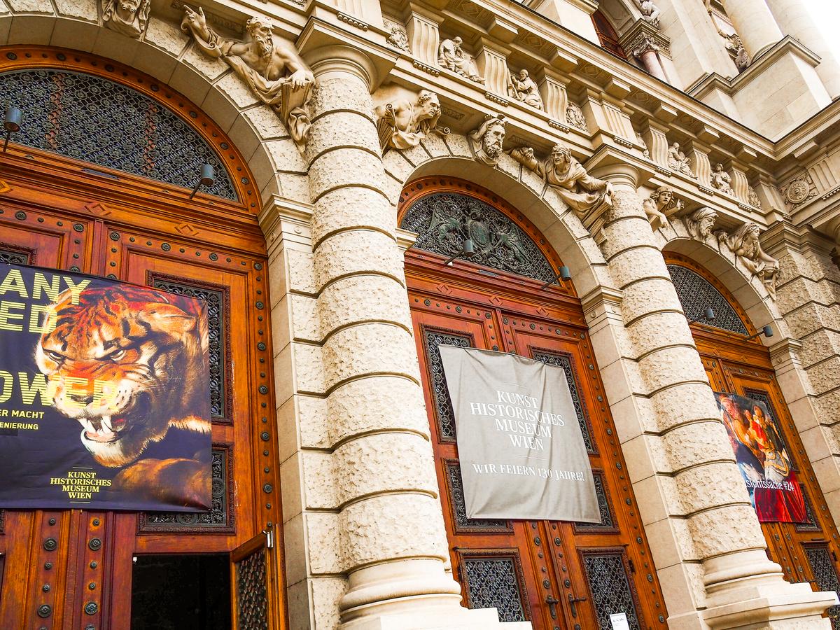 Entrance of Kunsthistorisches Museum Vienna with exhibition banners