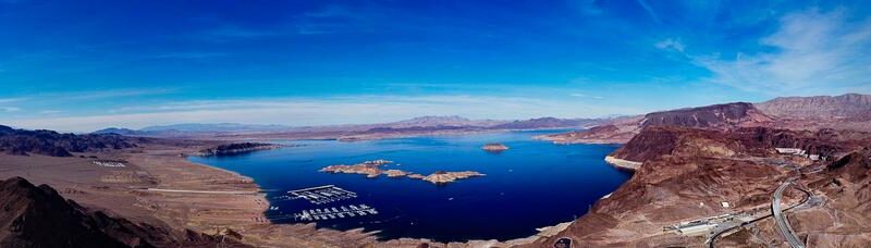 Aerial panorama of Lake Mead with surrounding desert landscape and clear blue skies