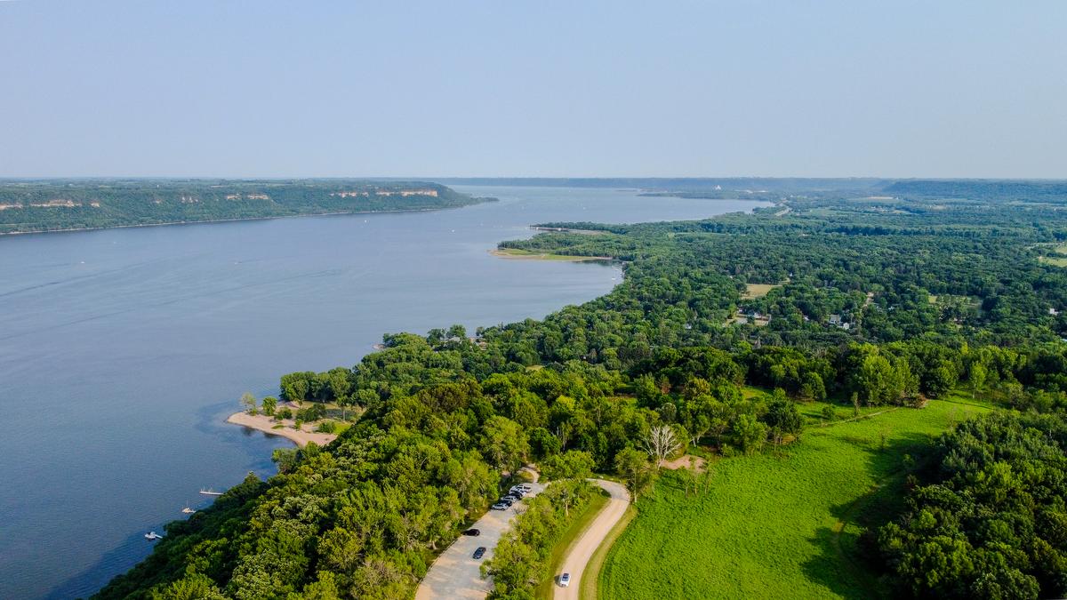 Aerial view of serene Lake Pepin with lush shoreline
