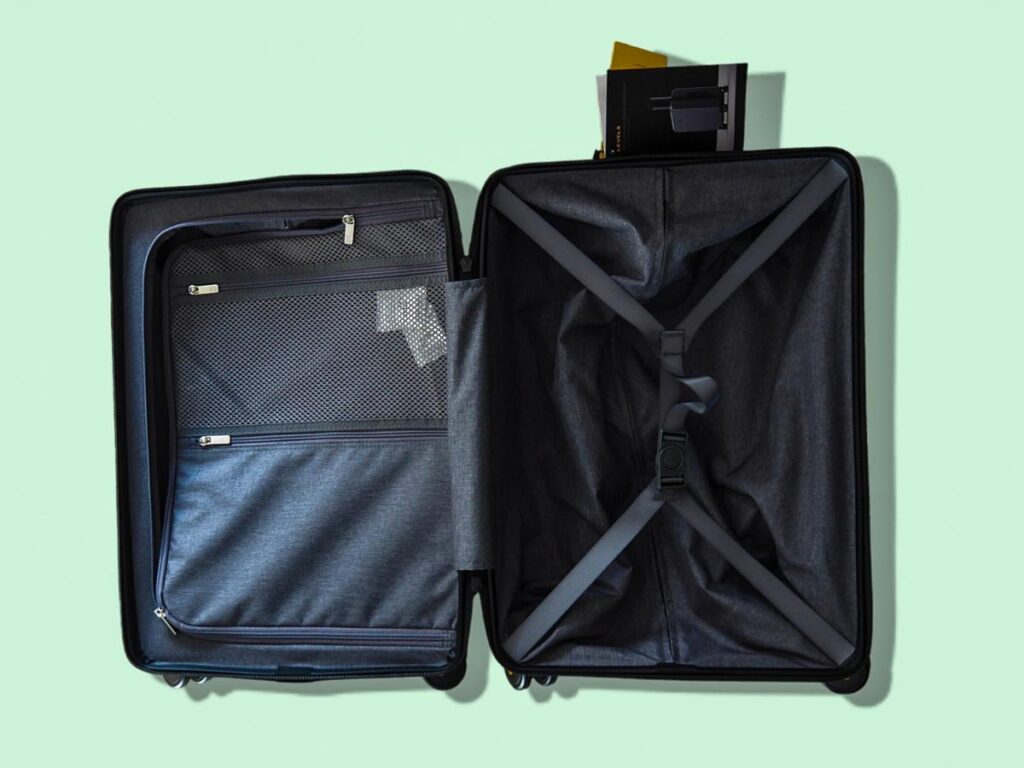 LEVEL8 hardside luggage interior with organized compartments and stylish design