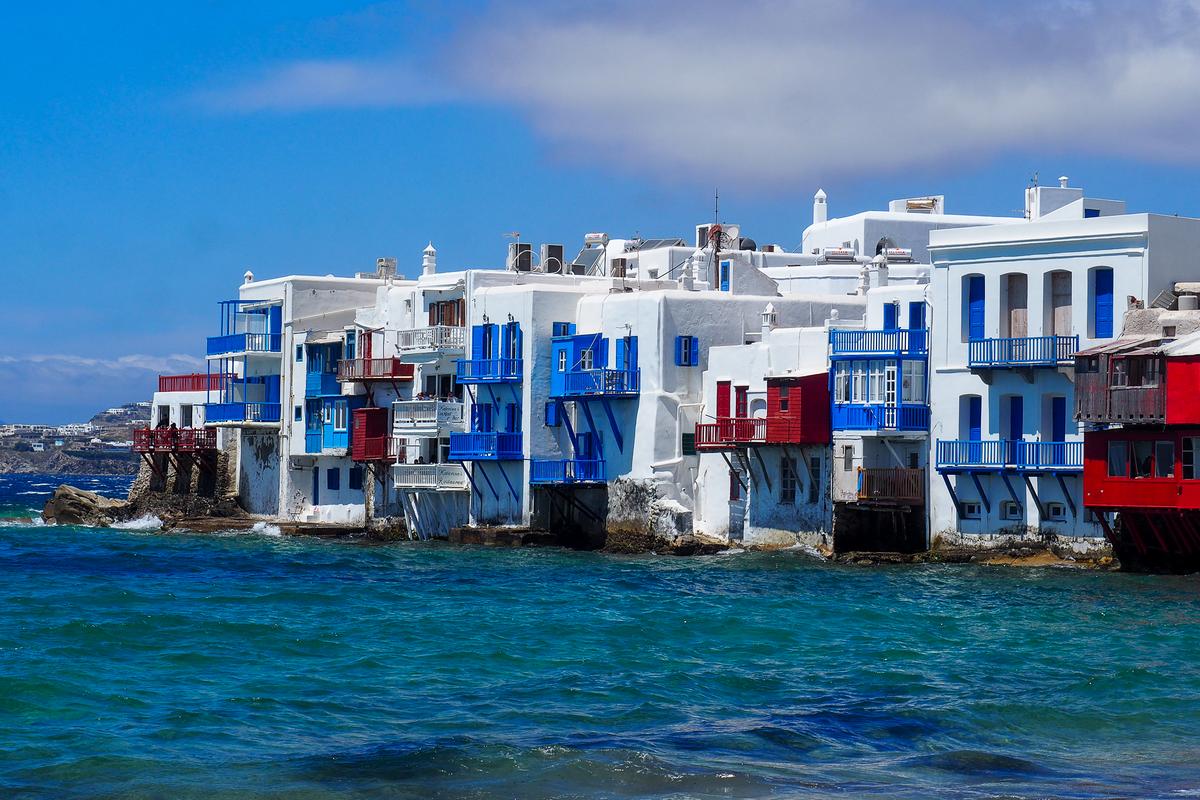 Little Venice Mykonos sunset with charming waterfront houses, popular Greek island destination