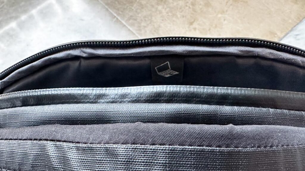 Close-up view of the interior compartment of a Lowepro Freeline BP backpack