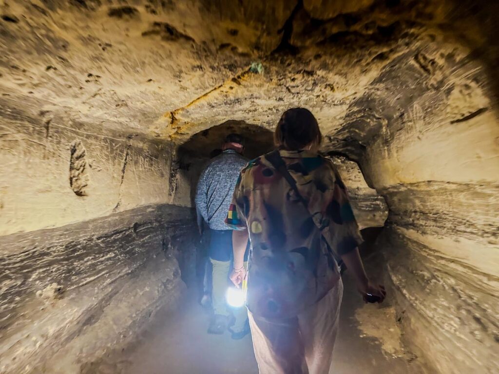 Exploring limestone caverns in Maastricht, Netherlands