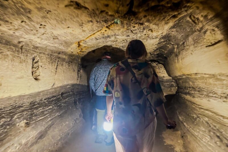Exploring limestone caverns in Maastricht, Netherlands