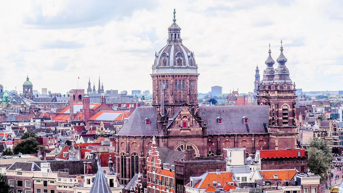 Majestic Basilica of Saint Nicholas, Amsterdam - Historic religious landmark amidst vibrant cityscape