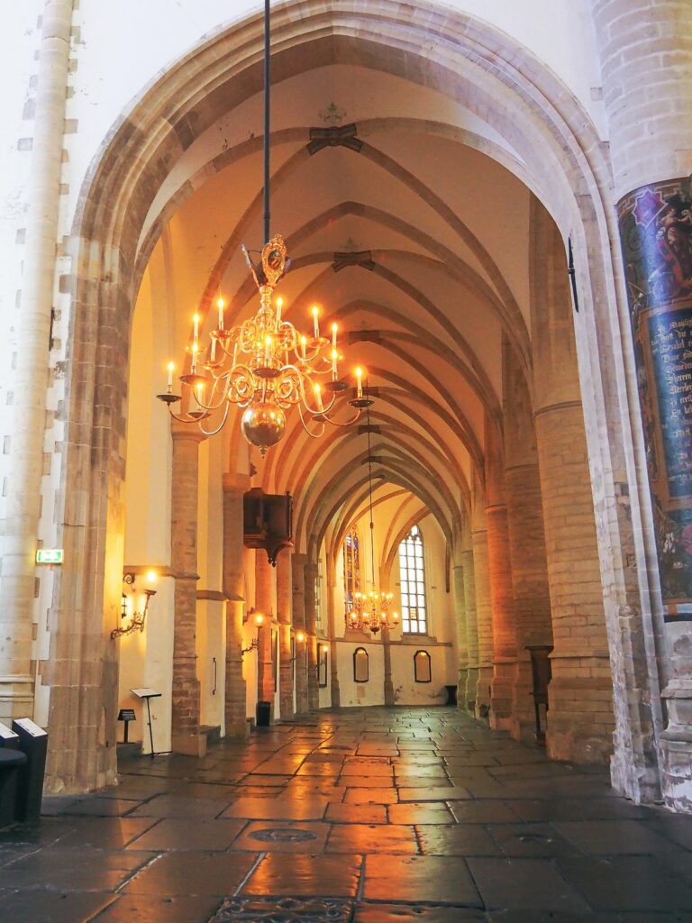 Interior of St. Bavo's Church, Haarlem with Gothic arches and vintage chandeliers