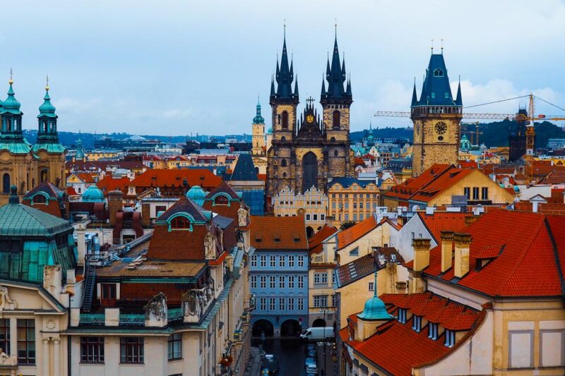 Majestic View of Church of Our Lady before Týn in Prague's Skyline - Gothic spires and historic architecture.