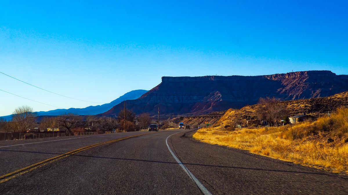 A road trip scene showcasing the colorful landscape along Zion Park Boulevard with clear blue skies, red sandstone cliffs, and a smooth road inviting exploration. (source: [AIContentfy](https://aicontentfy.com/en/blog/how-to-use-image-alt-tags-to-boost-seo))