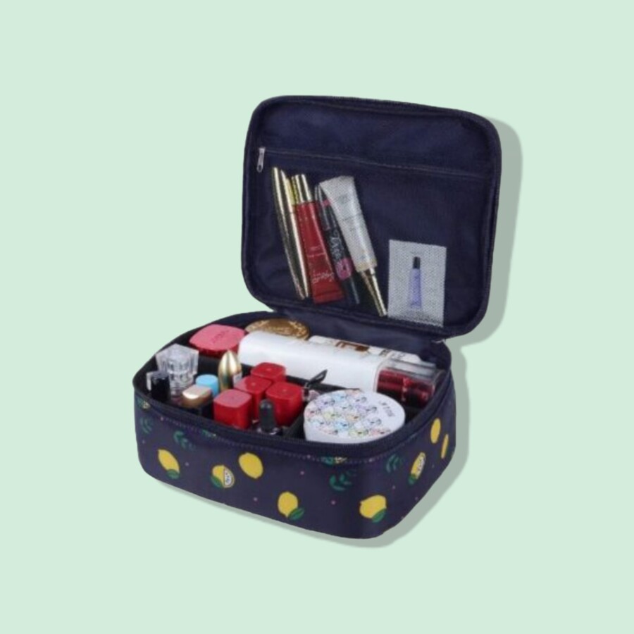 Makeup bag for travel filled with different cosmetic products